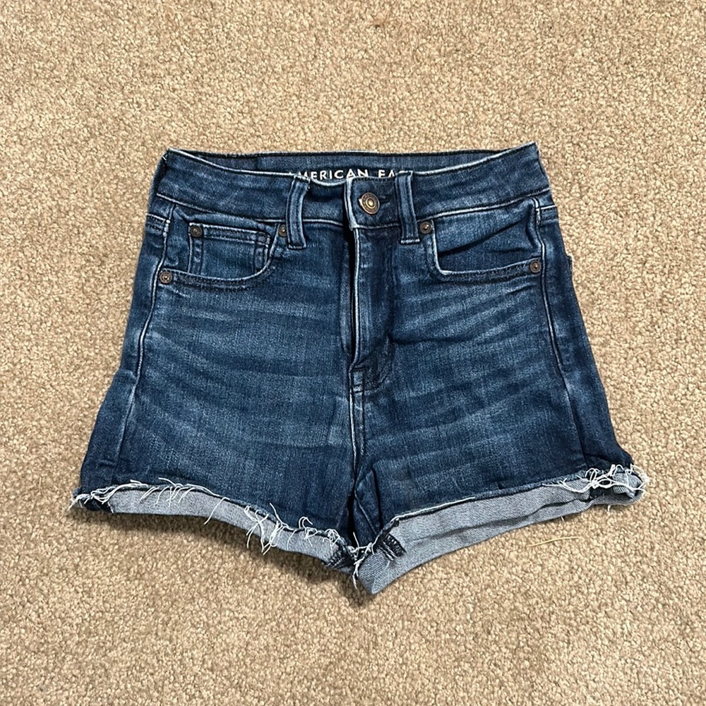 Never worn, 00 American eagle jean shorts, in dark blue.